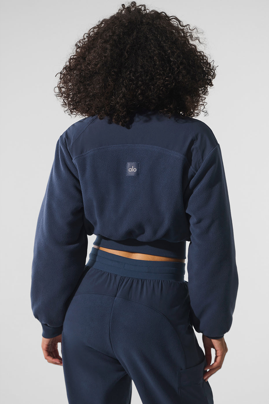 Side angle of the cropped fleece jacket showcasing its fit
