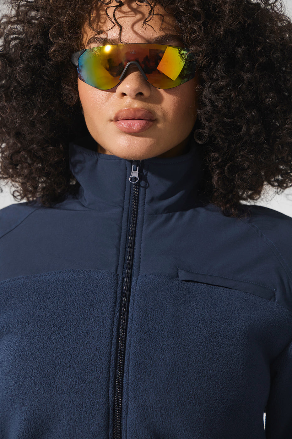 Back view highlighting the cropped design of the winter jacket
