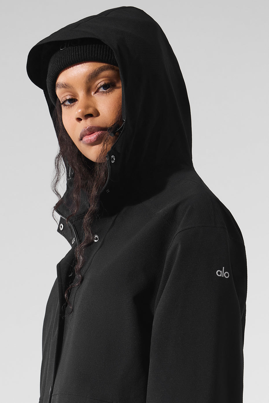 Zippered side pockets of the womens Helly Hansen rain coat shown in detail.