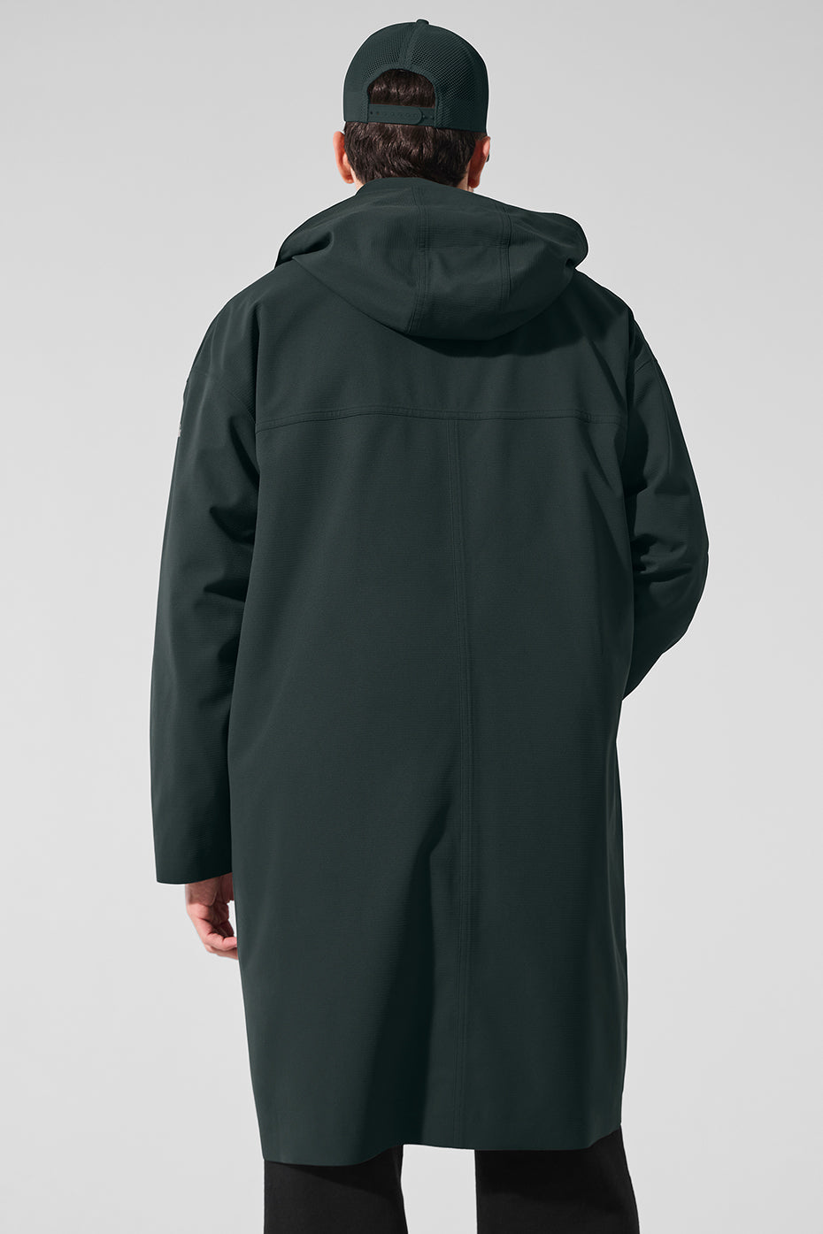 Casual look featuring a long puffer coat in charcoal green