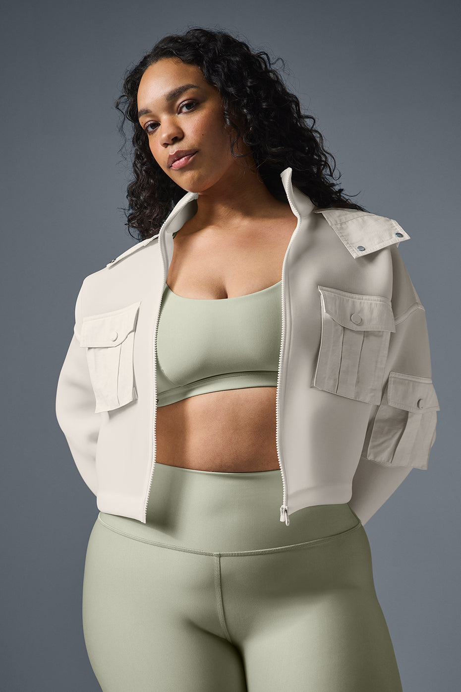 Back view of the womens scuba jacket demonstrating the adjustable hood.