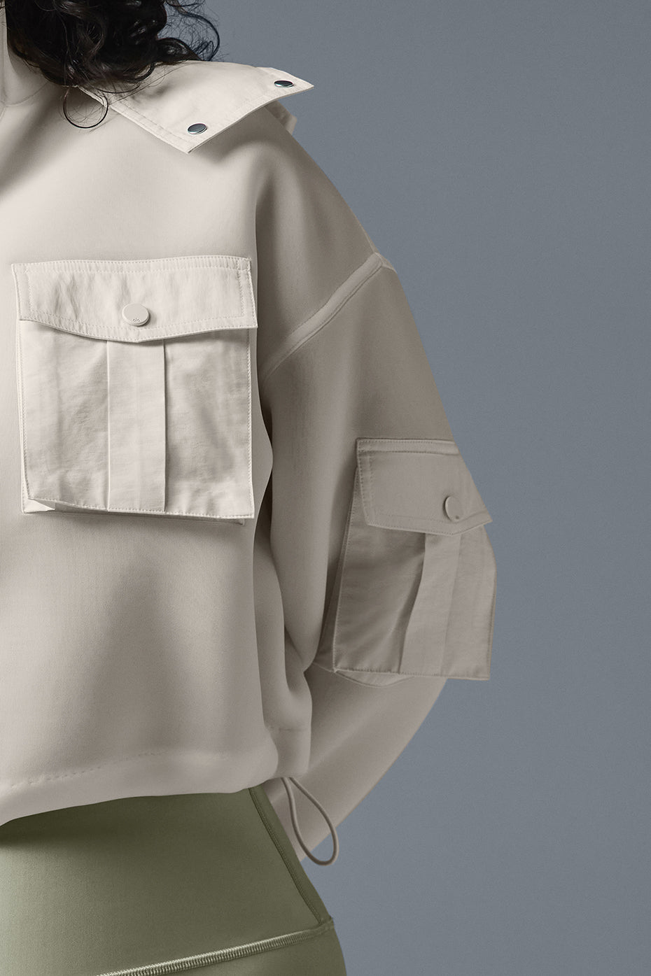 Back view of the womens scuba jacket demonstrating the adjustable hood.