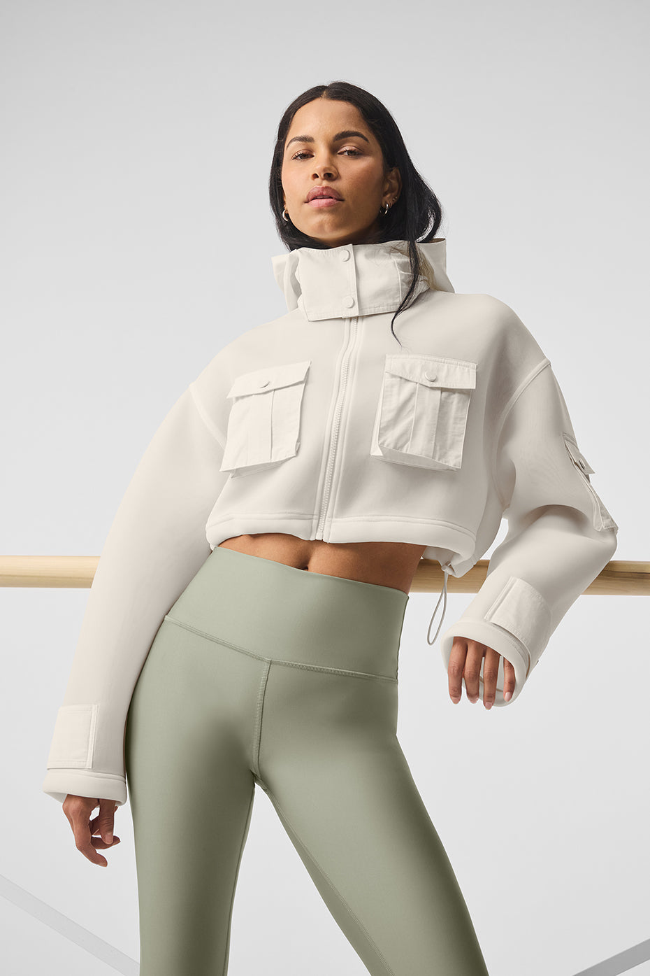 Front view of the chic ivory cropped cargo jacket showcasing its stylish design.