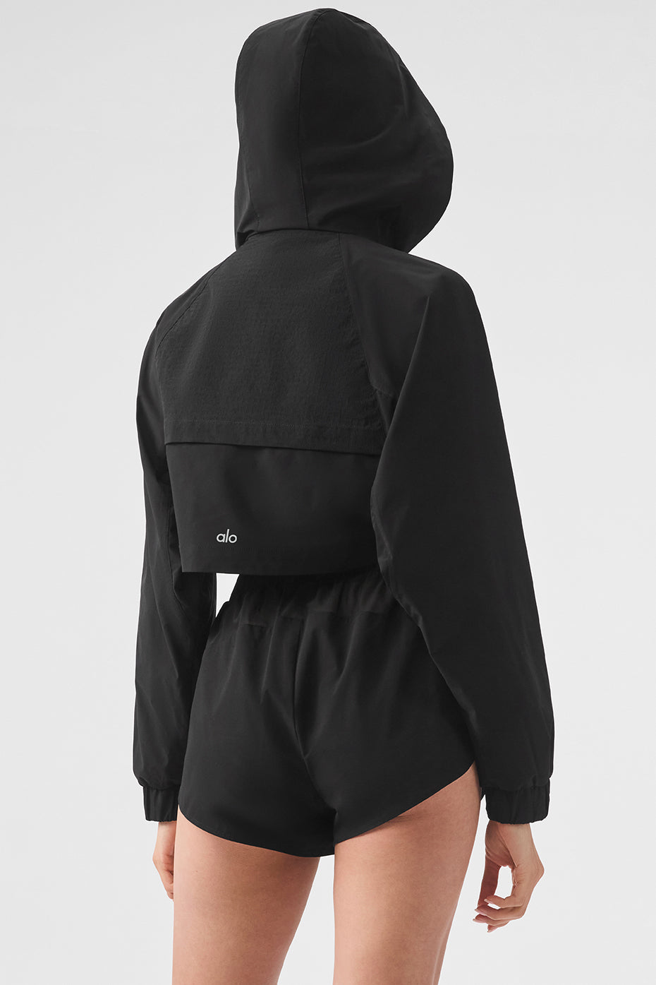 Front view of the cropped puffer jacket, showcasing its stylish design.