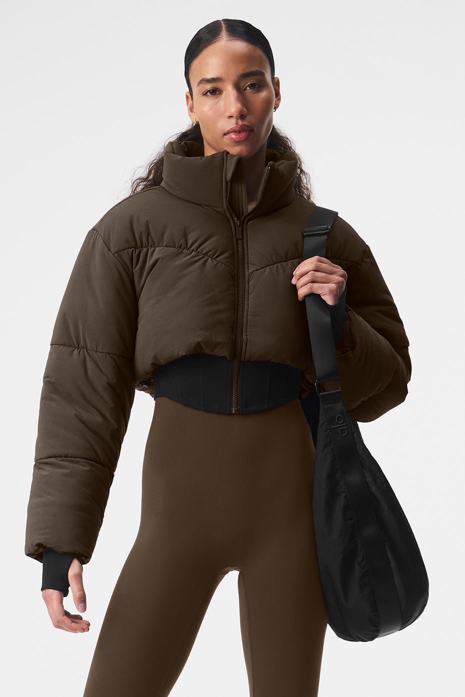 Front view of the corset puffer jacket in Espresso/Black, showcasing its stylish design.