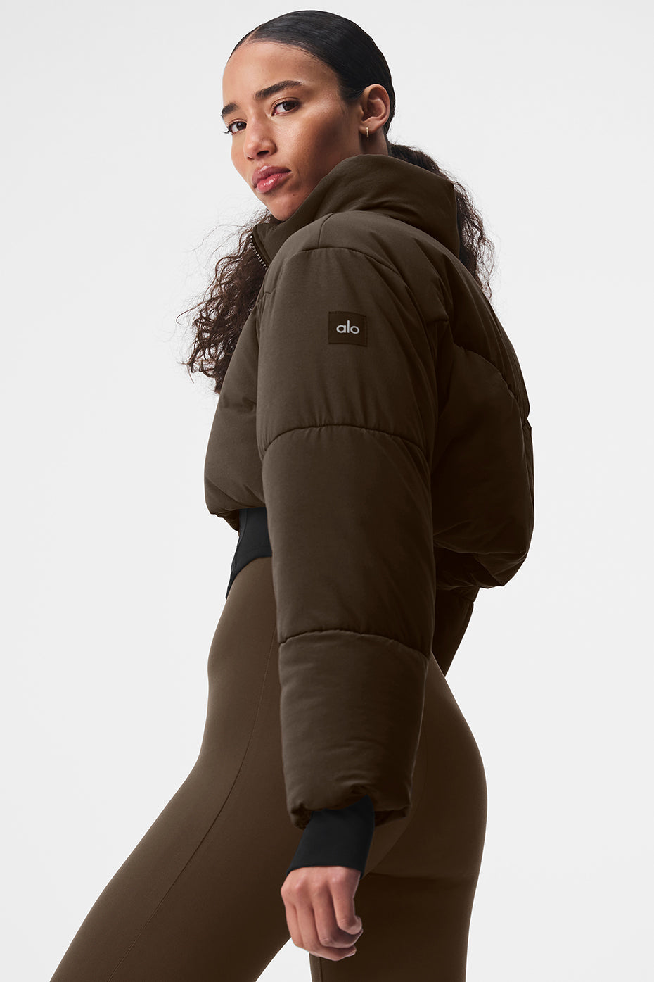 Front view of the corset puffer jacket in Espresso/Black, showcasing its stylish design.