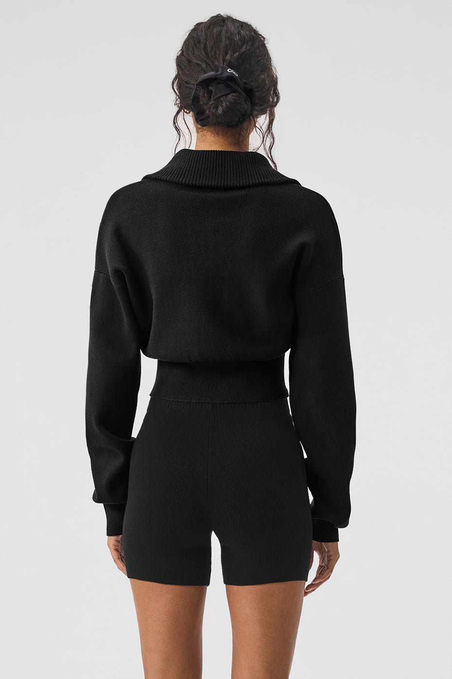 Side view of the Scholar Knit Cropped Jacket, highlighting the cinched waist.