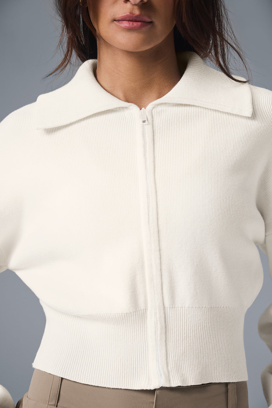 Side angle of the Scholar Knit Cropped Jacket, highlighting the ribbed cuffs and waist.