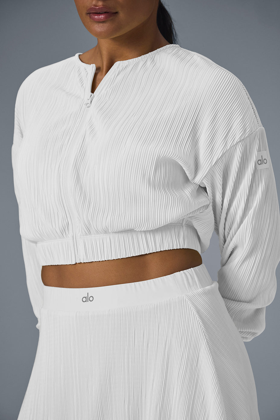 Outfit idea: white tuxedo jacket styled with tailored pants