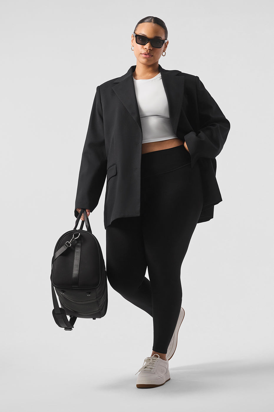 Model wearing a boxy blazer styled with casual outfits