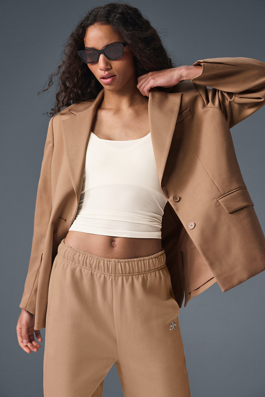 Close-up of the oversized blazers lapels and tailored fit in toasted almond color