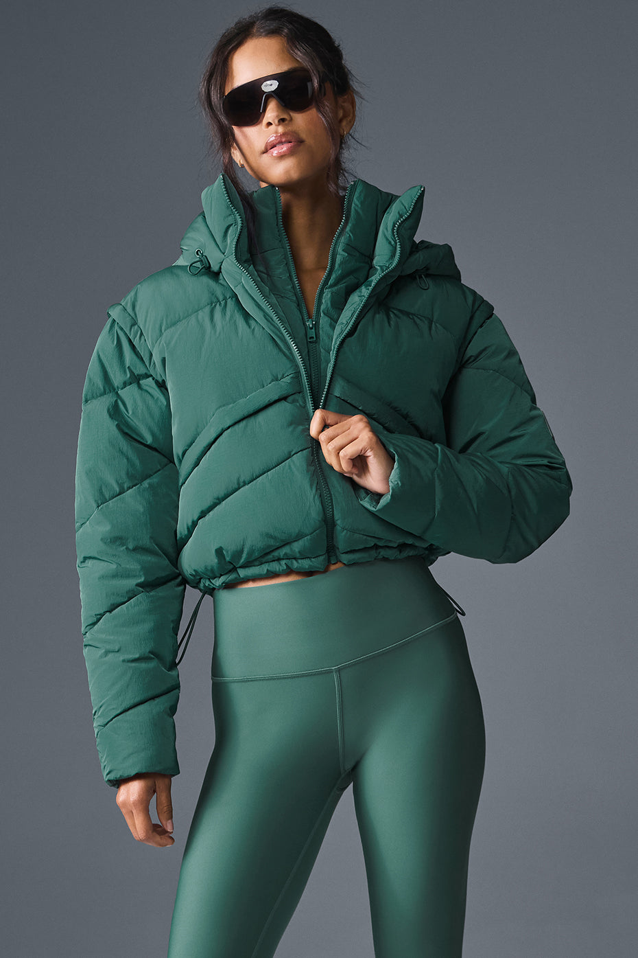 Front view of the Ivy Glacier men's puffer jacket in winter cityscape.