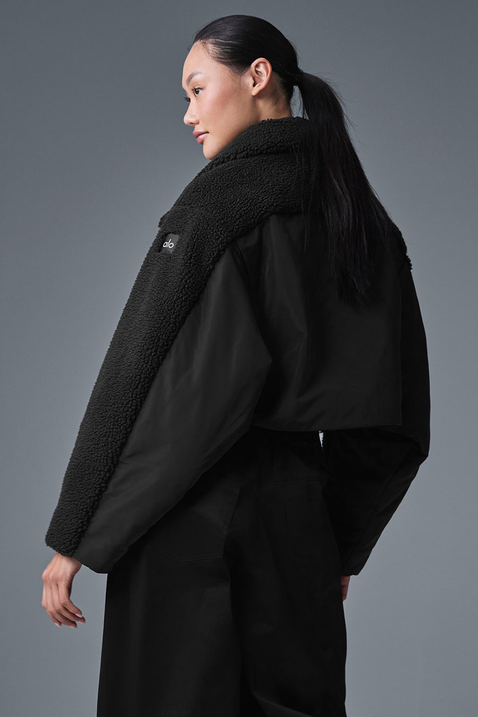 Close-up of the lightweight fill and textured fabric of the puffer jacket