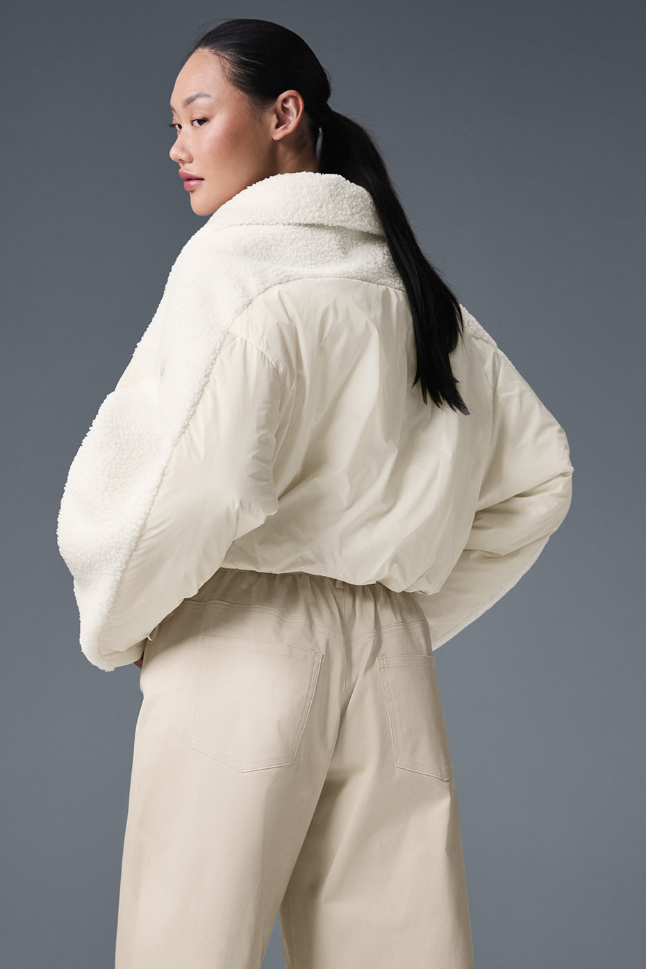 Back view showing the jackets relaxed fit and textured sherpa detailing
