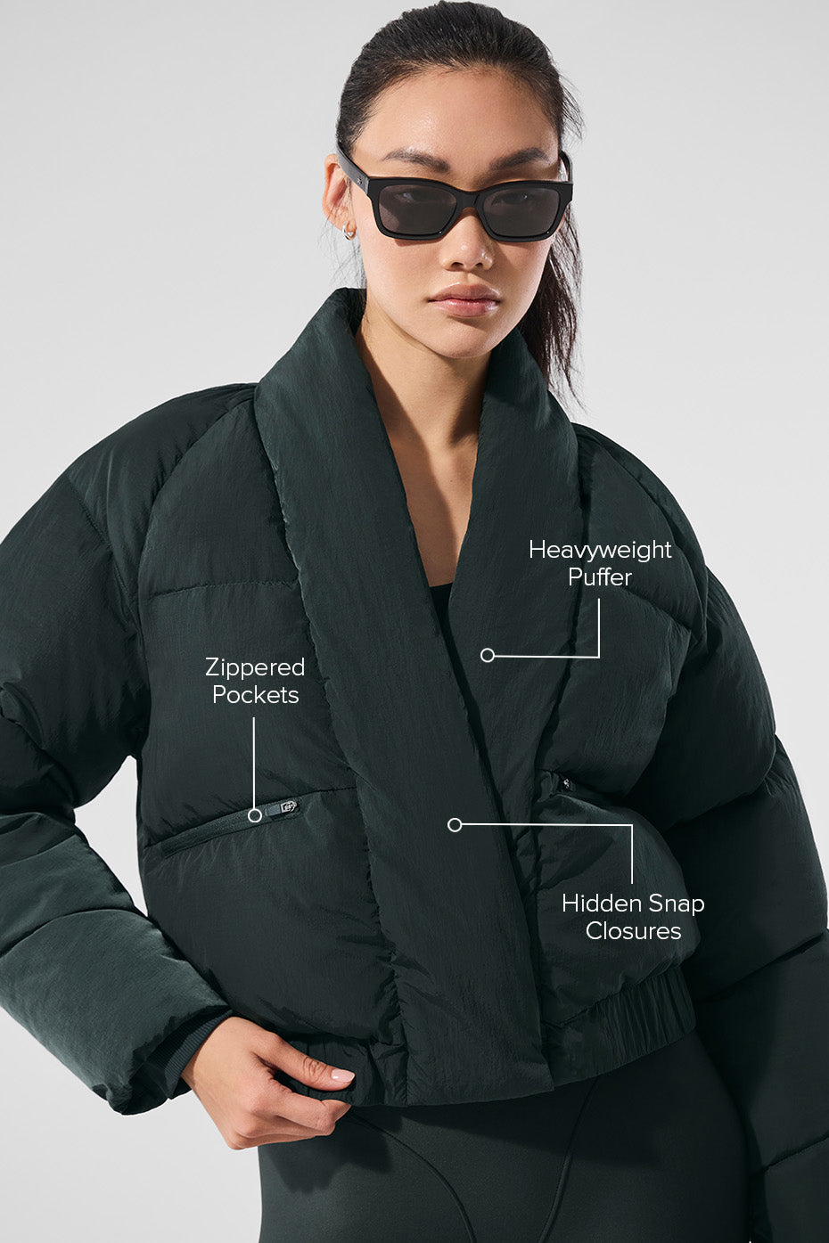 Side view showcasing the zippered pockets of the puffer jacket