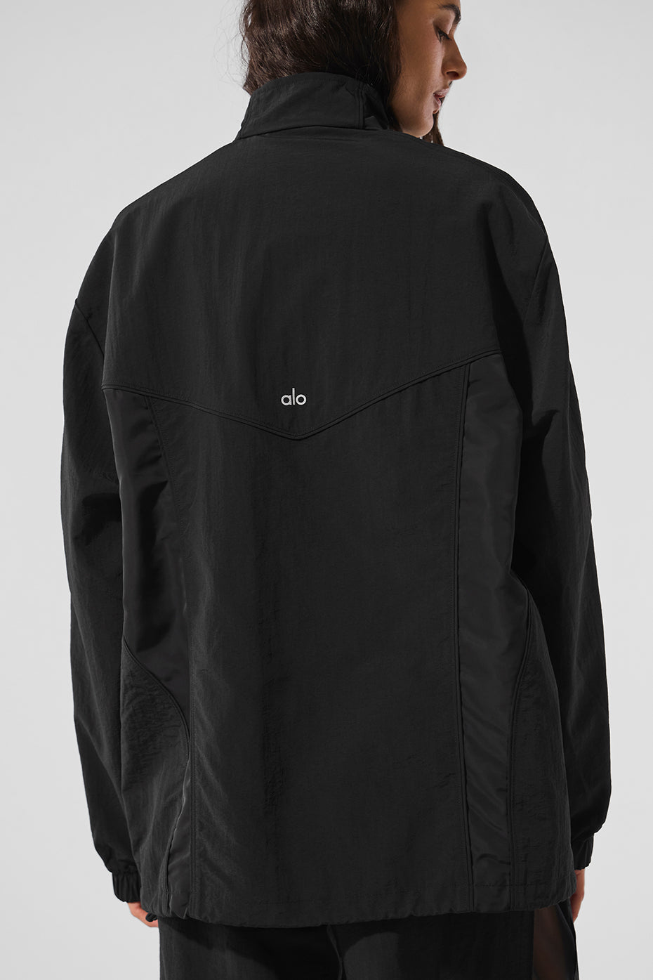 Detail shot of full zip closure and tonal piping