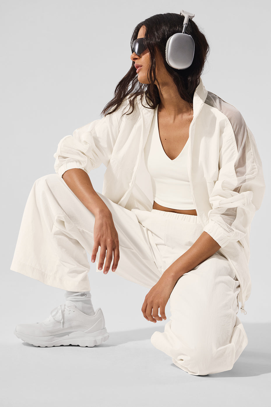 Street-style look: Origin jacket paired with black activewear dress