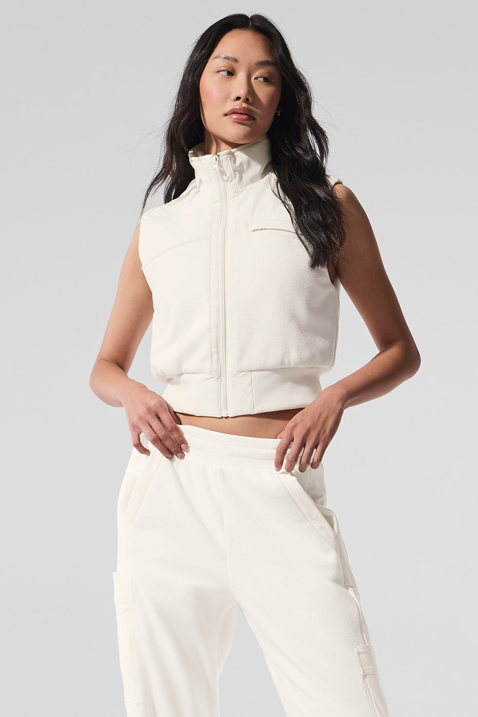 Front view of the cozy polar fleece vest in ivory, perfect for layering.