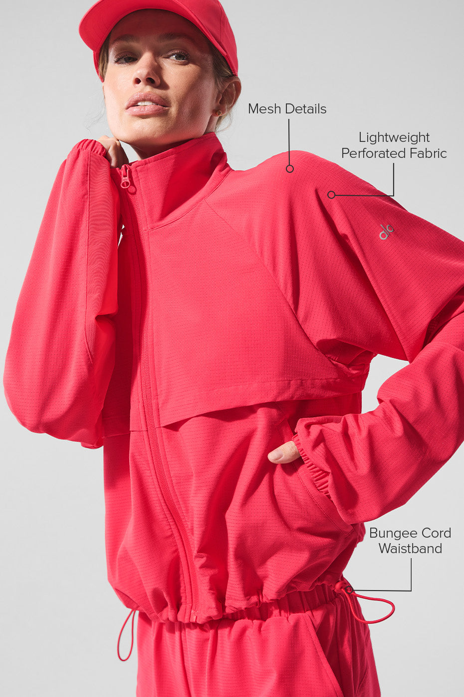 Side view of the zip up jacket paired with shorts, perfect for casual outings.