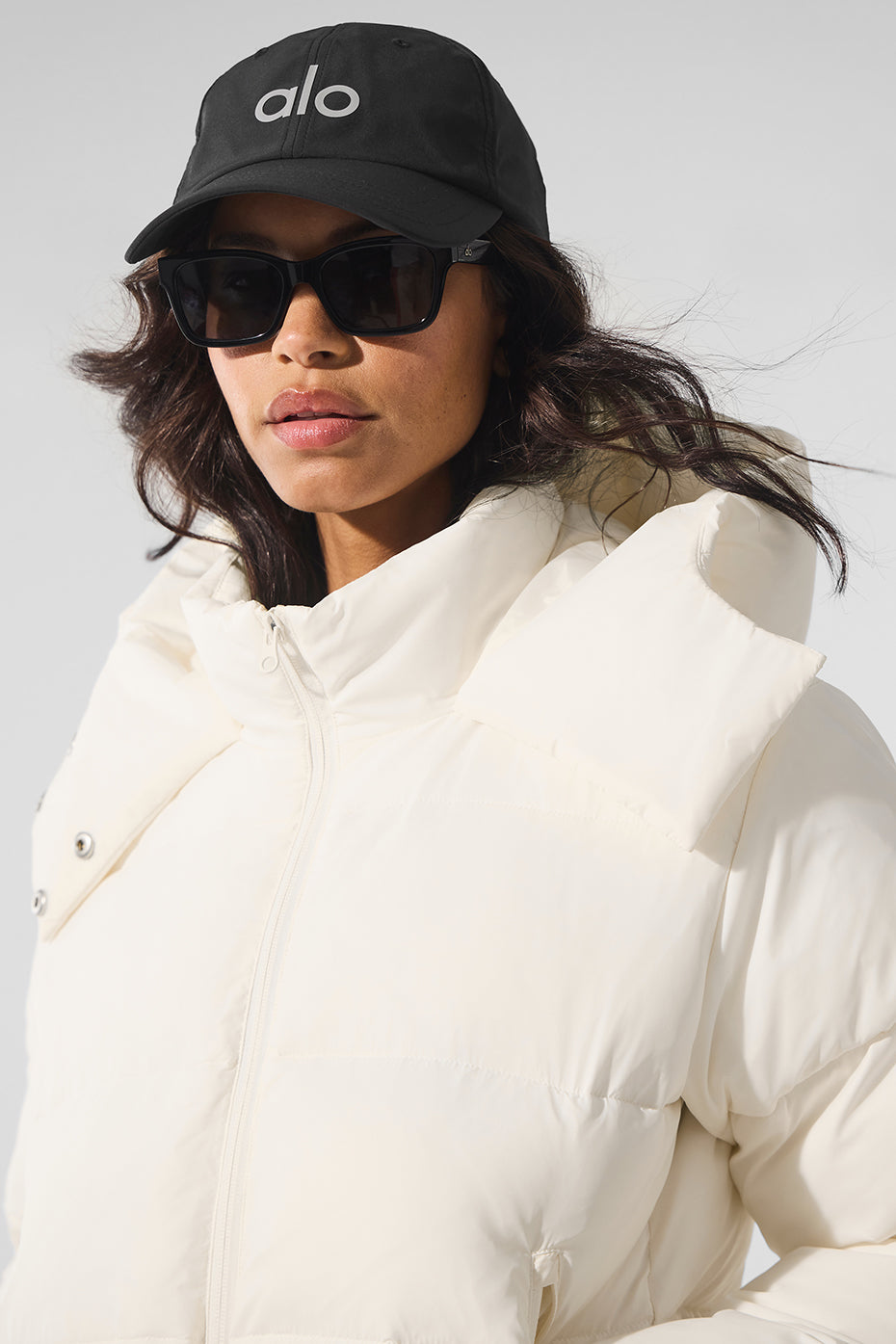 Columbia puffer jacket womens model wearing it with jeans and boots