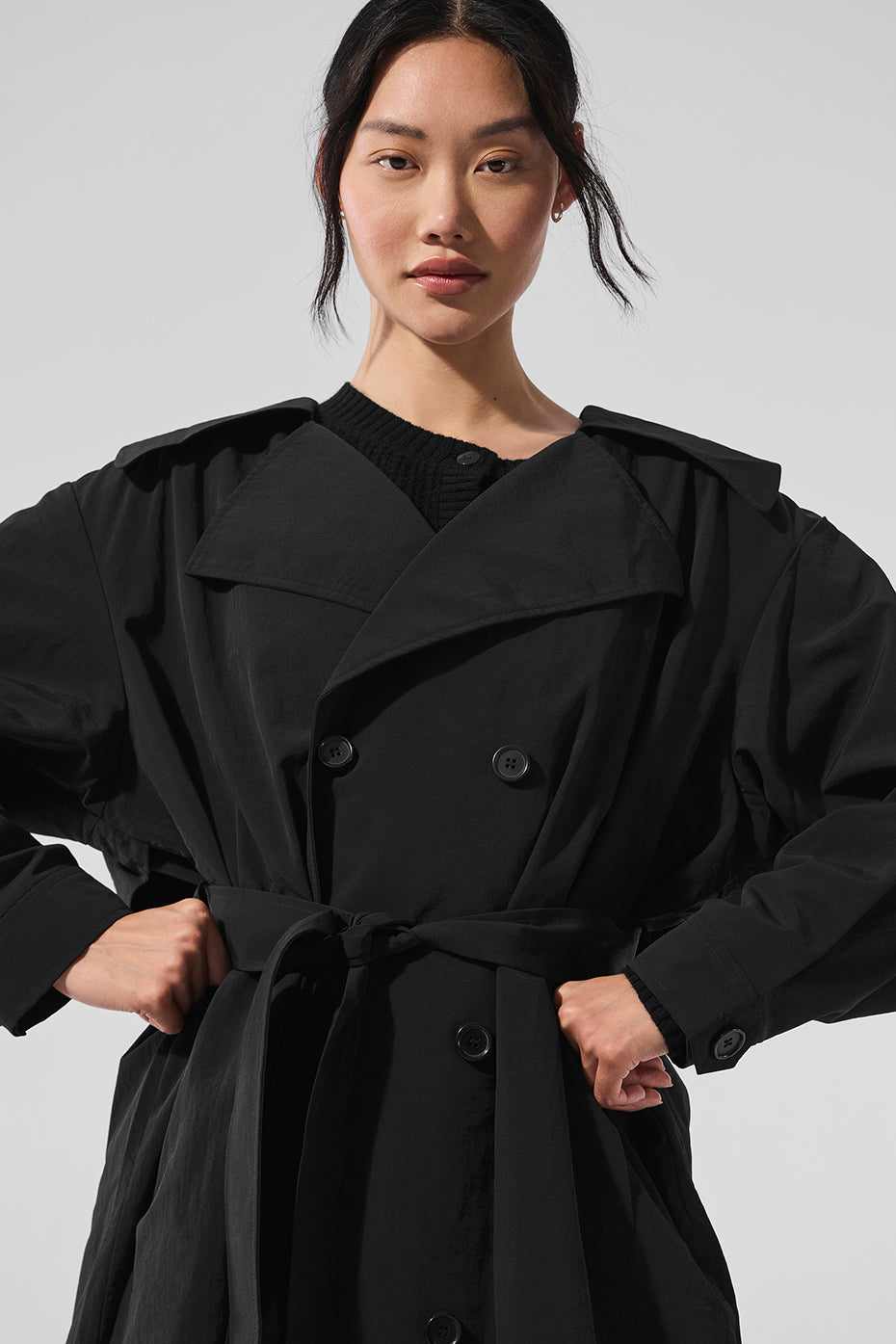 Side view showcasing the tailored fit of the long coat for men