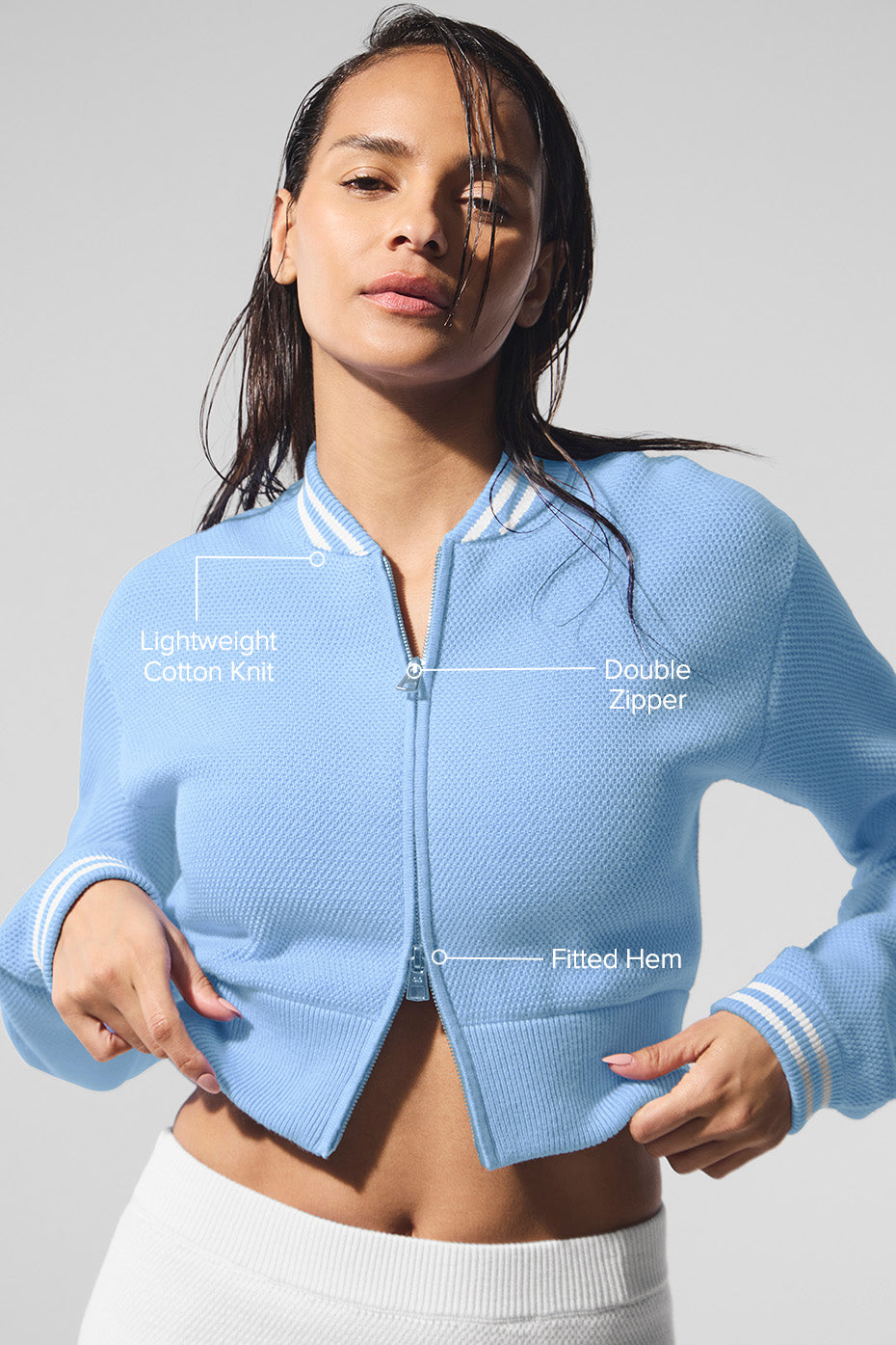 Close-up of cotton knit texture and zip detail