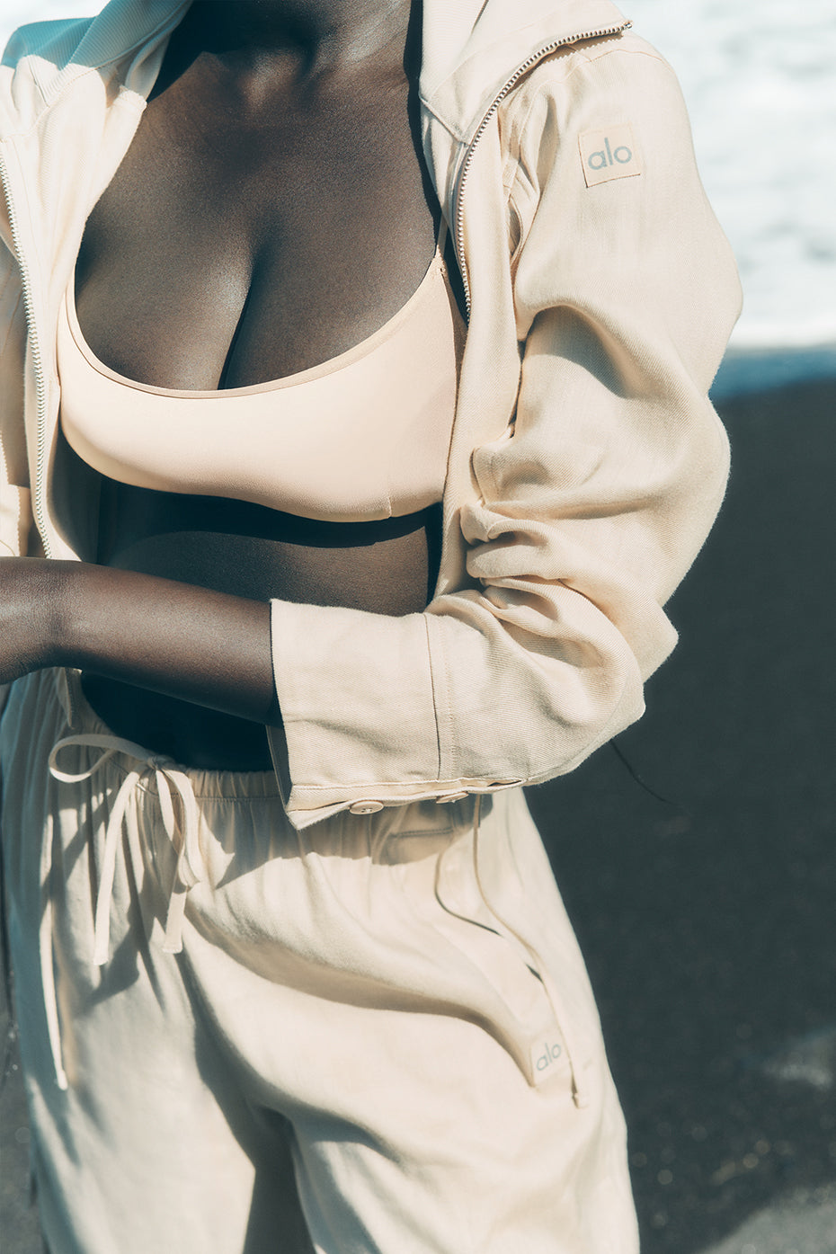 Front view of the macadamia linen cropped getaway jacket, showcasing its stylish collar.