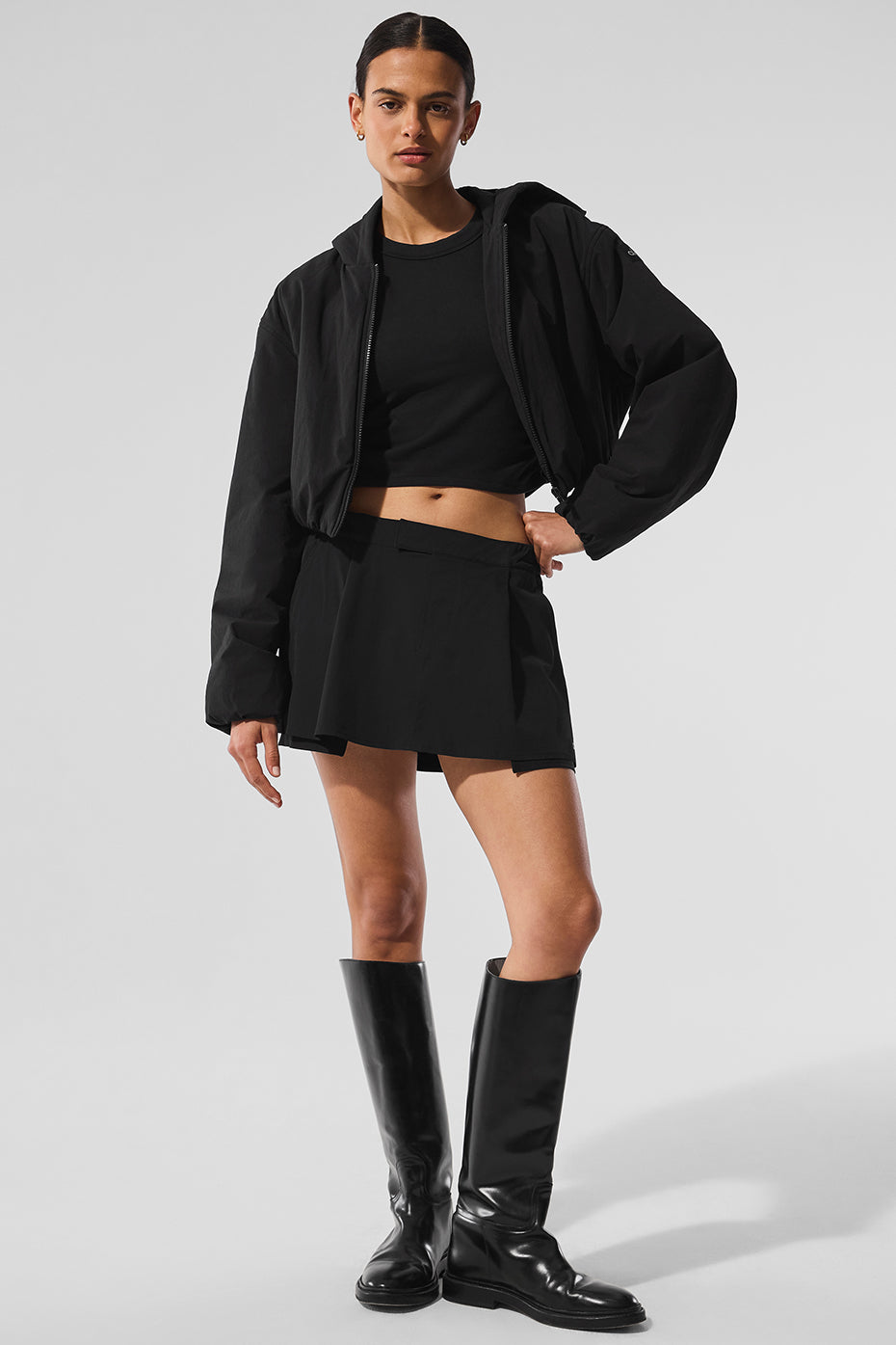 Full zip hoodie displayed on a model in an urban setting, ideal for casual outings.