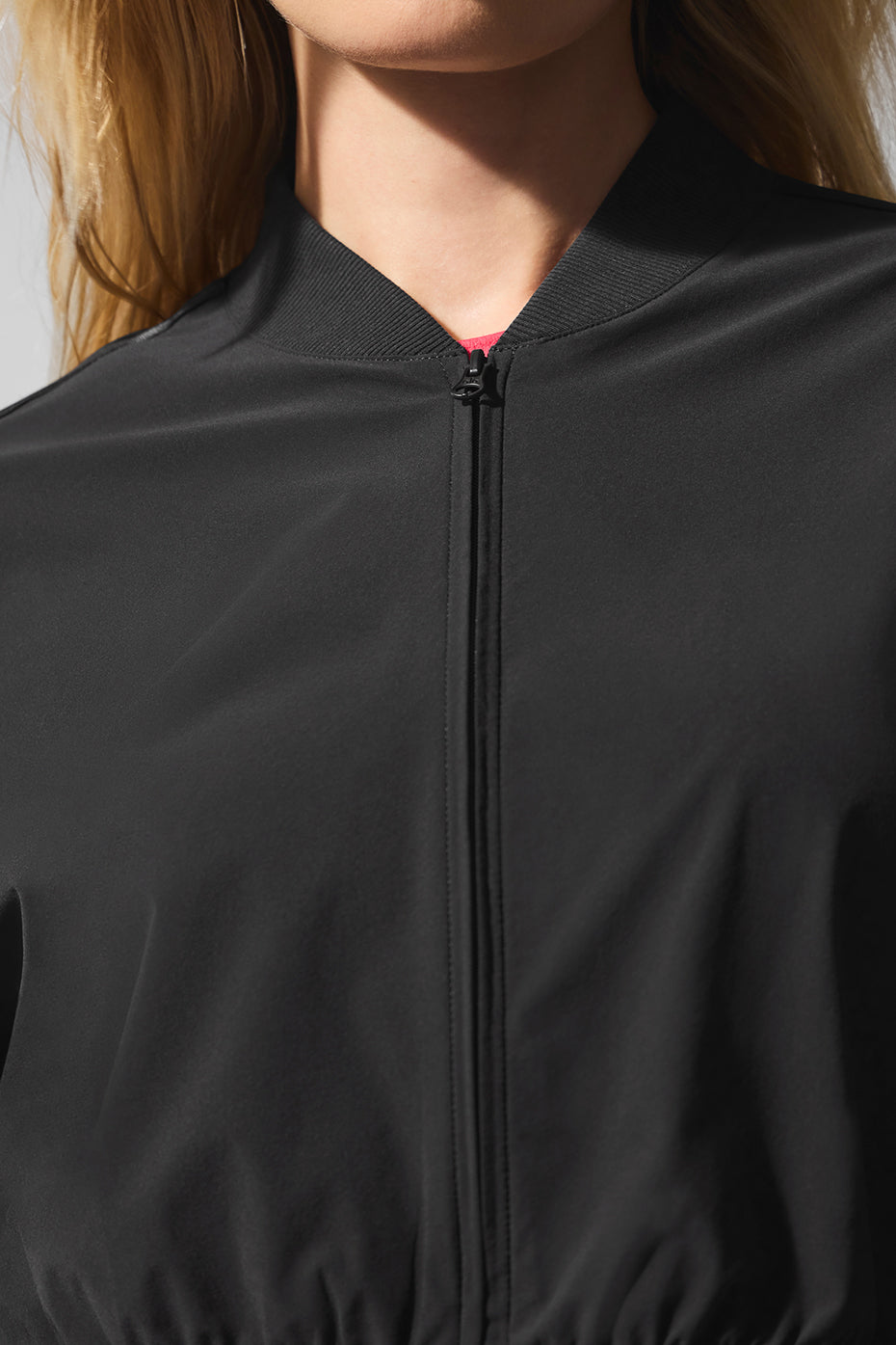 Side view of the lightweight cropped jacket, ideal for layering in spring.