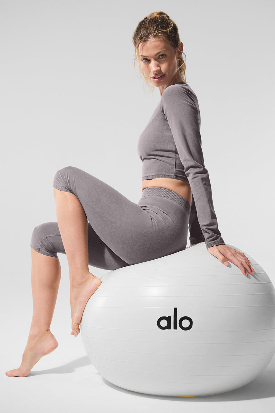 Front view of retro high-waist capri pants in cool grey, perfect for summer.