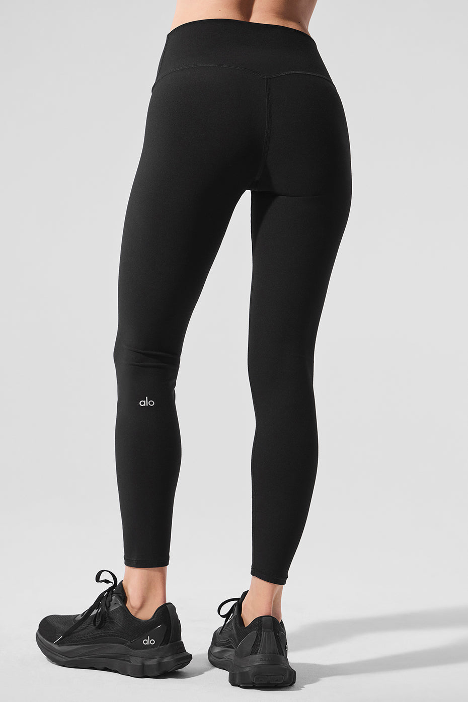 Side view showcasing the contouring back seam of the high-waist leggings.