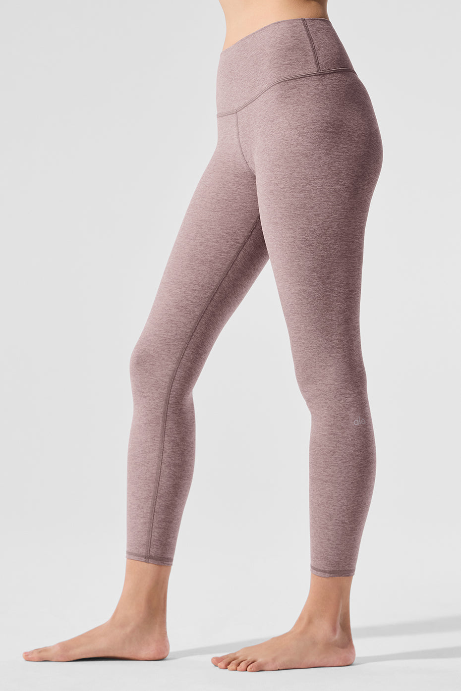Side view showcasing the contouring back seam of the leggings