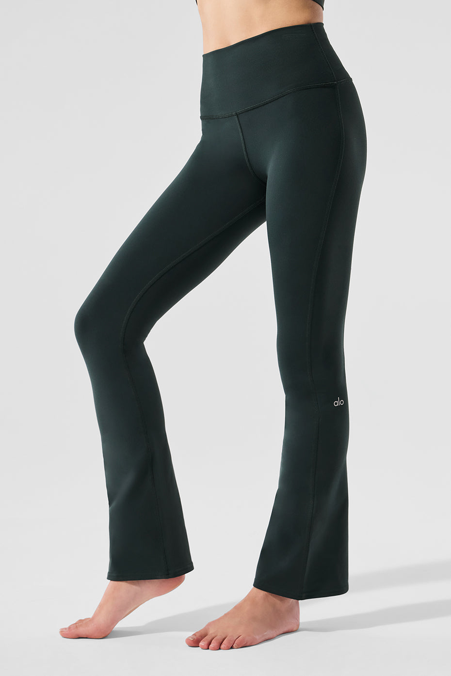 Front view of high waist leggings with pockets in Charcoal Green, highlighting the flattering fit