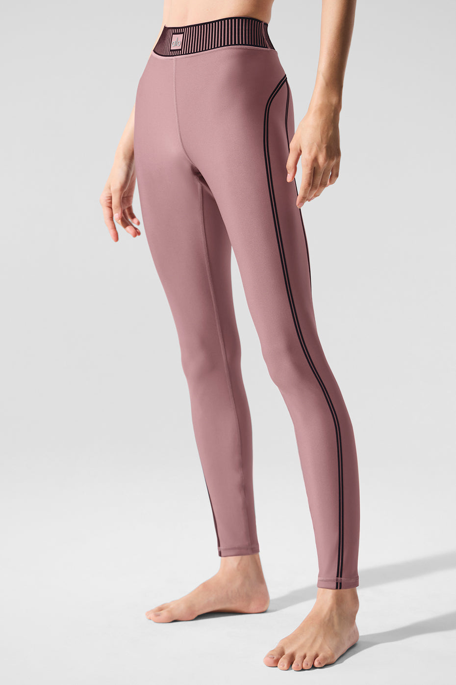 Front view of high-waist leggings with flocking detail for women activewear