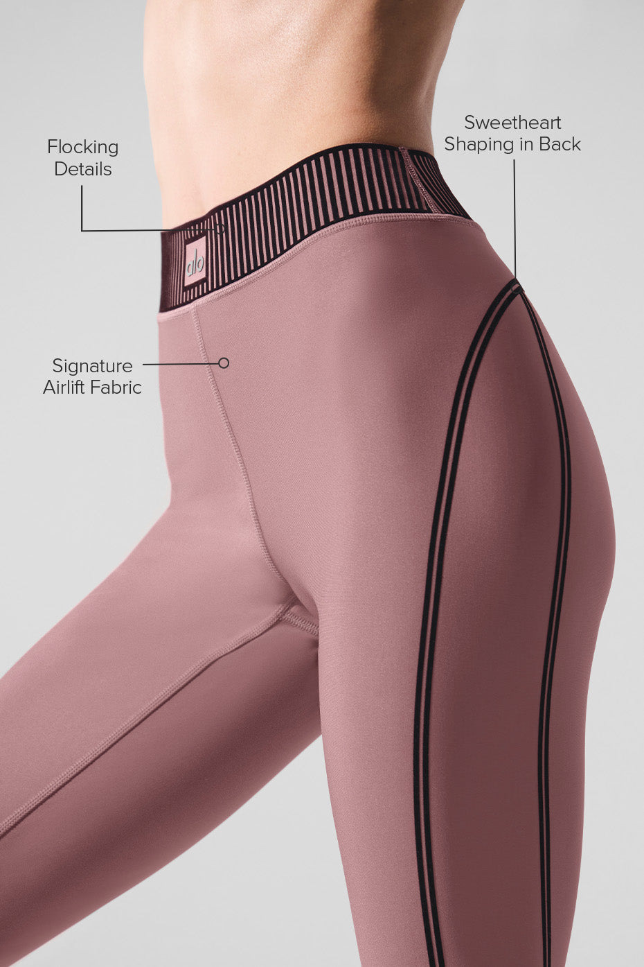 Side angle showing the high-rise waistband and sleek fit for workout leggings