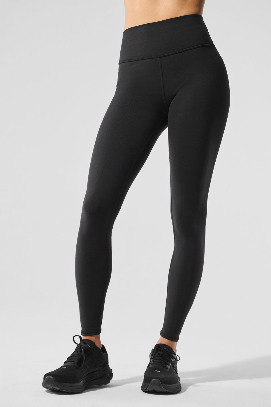 Front view of Nocturne high-waist yoga leggings in black.