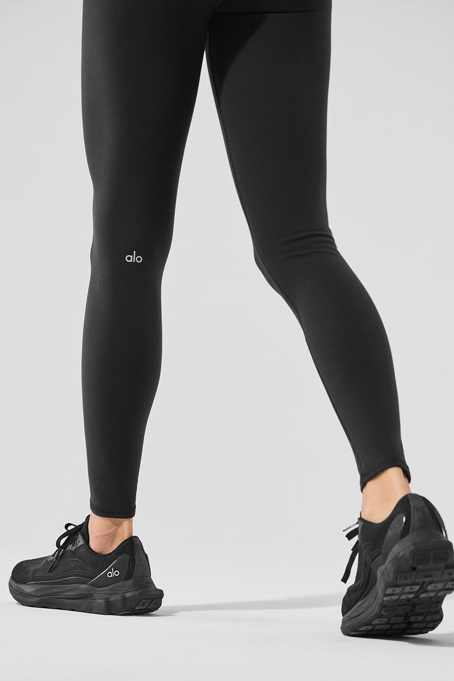 Front view of Nocturne high-waist yoga leggings in black.
