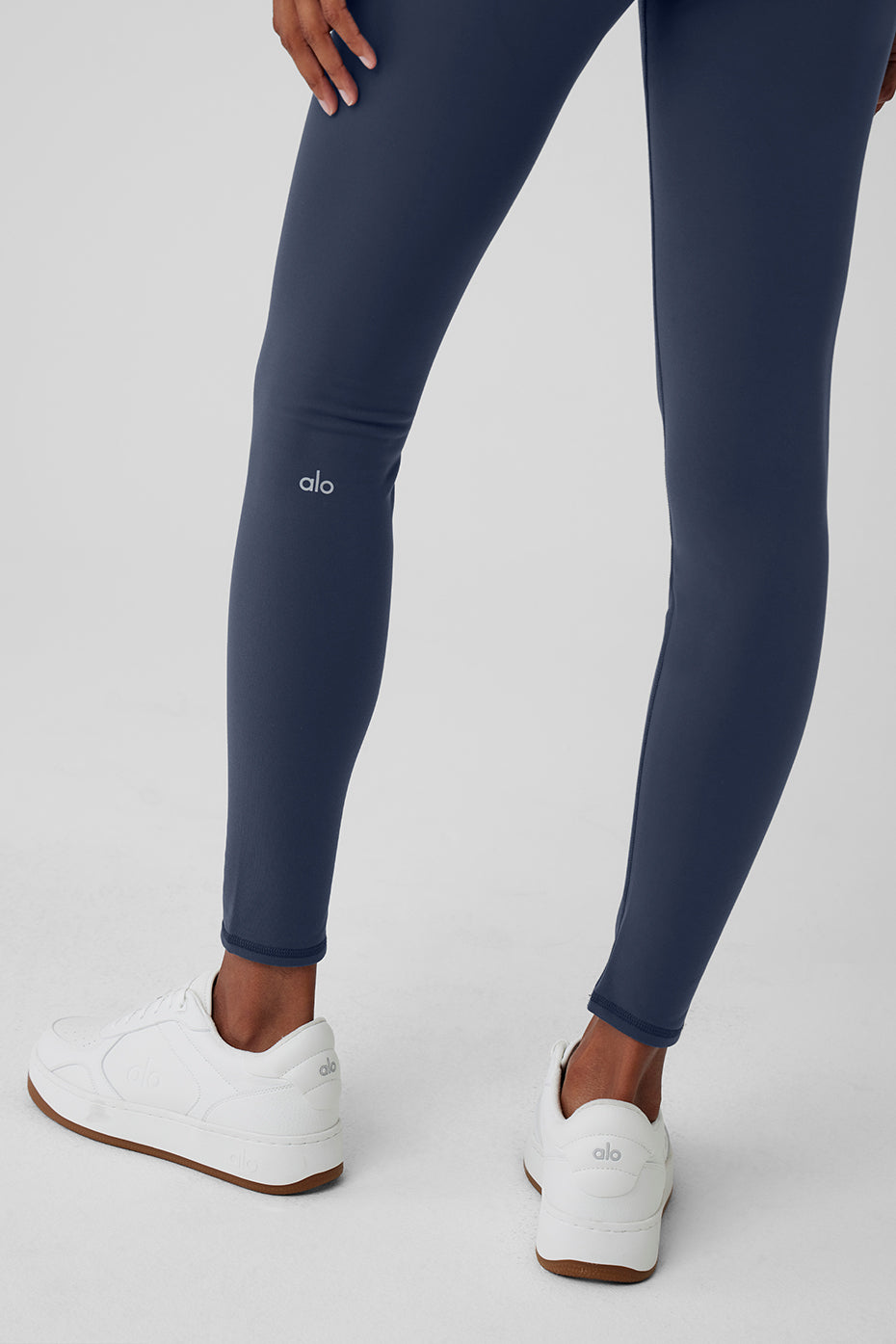 Side view showcasing the sweetheart back design of the leggings.