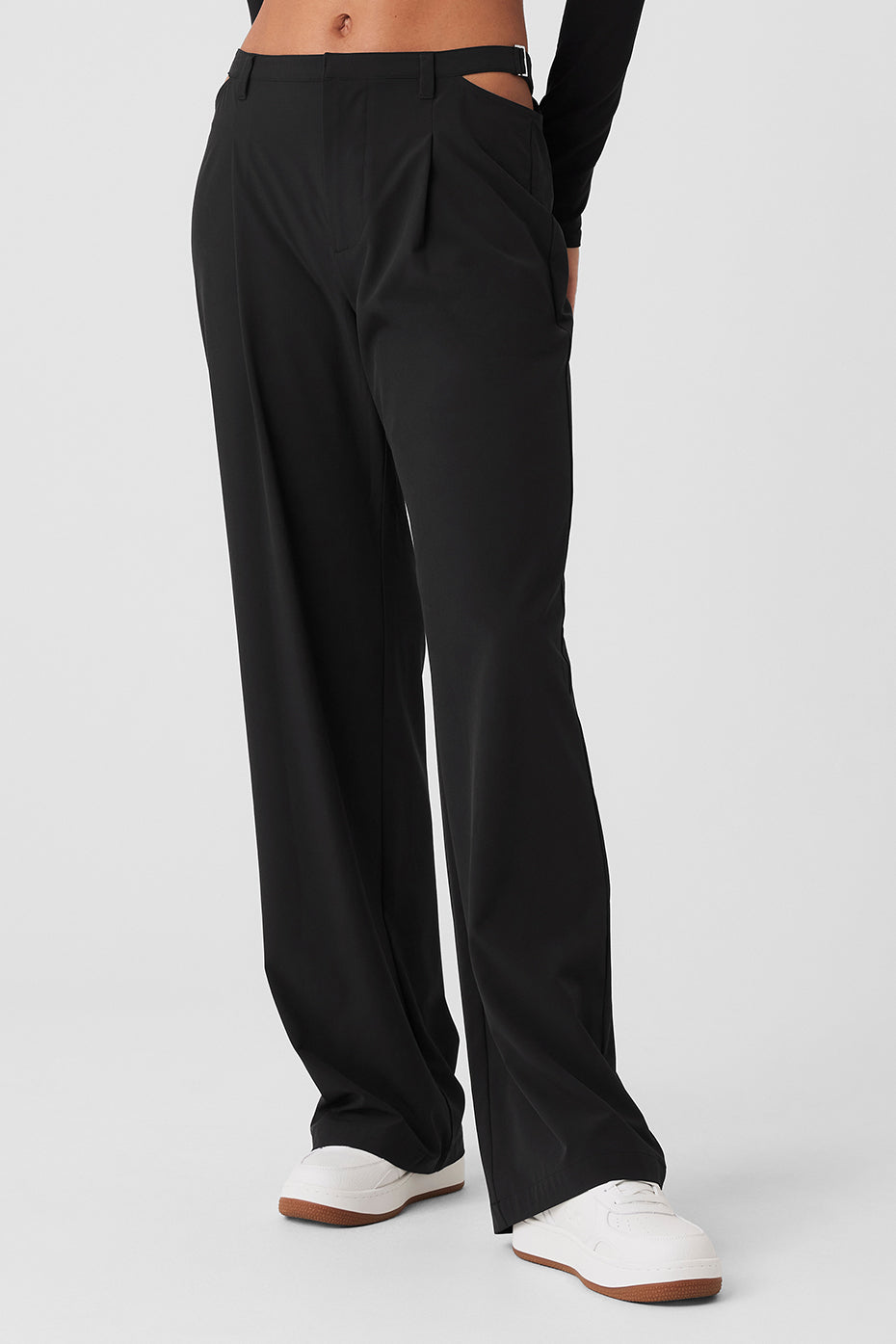 Back view of black trousers with faux pockets, ideal for casual or formal wear.