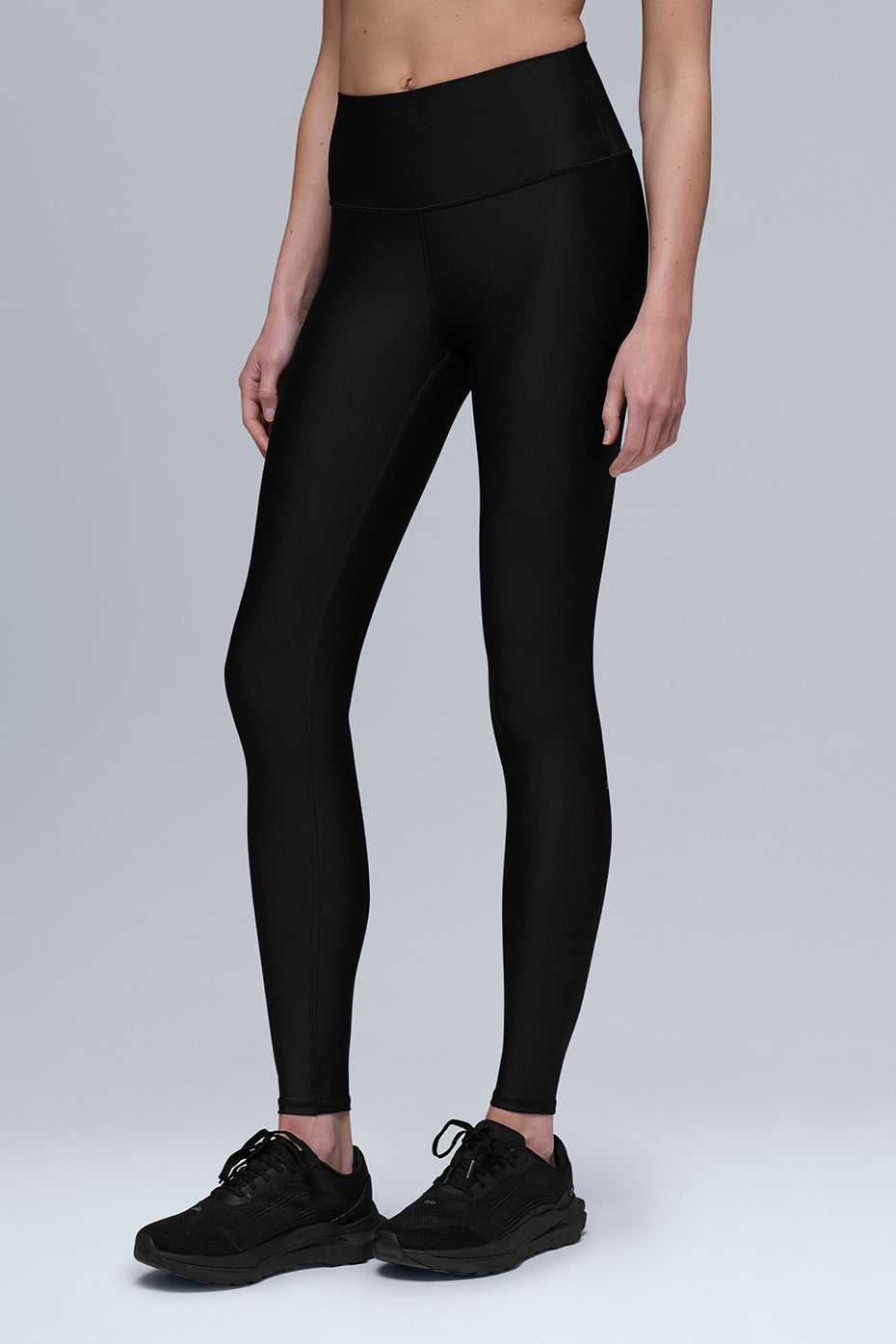 Model wearing thermal leggings women style, paired with a cozy top for winter outdoor walk