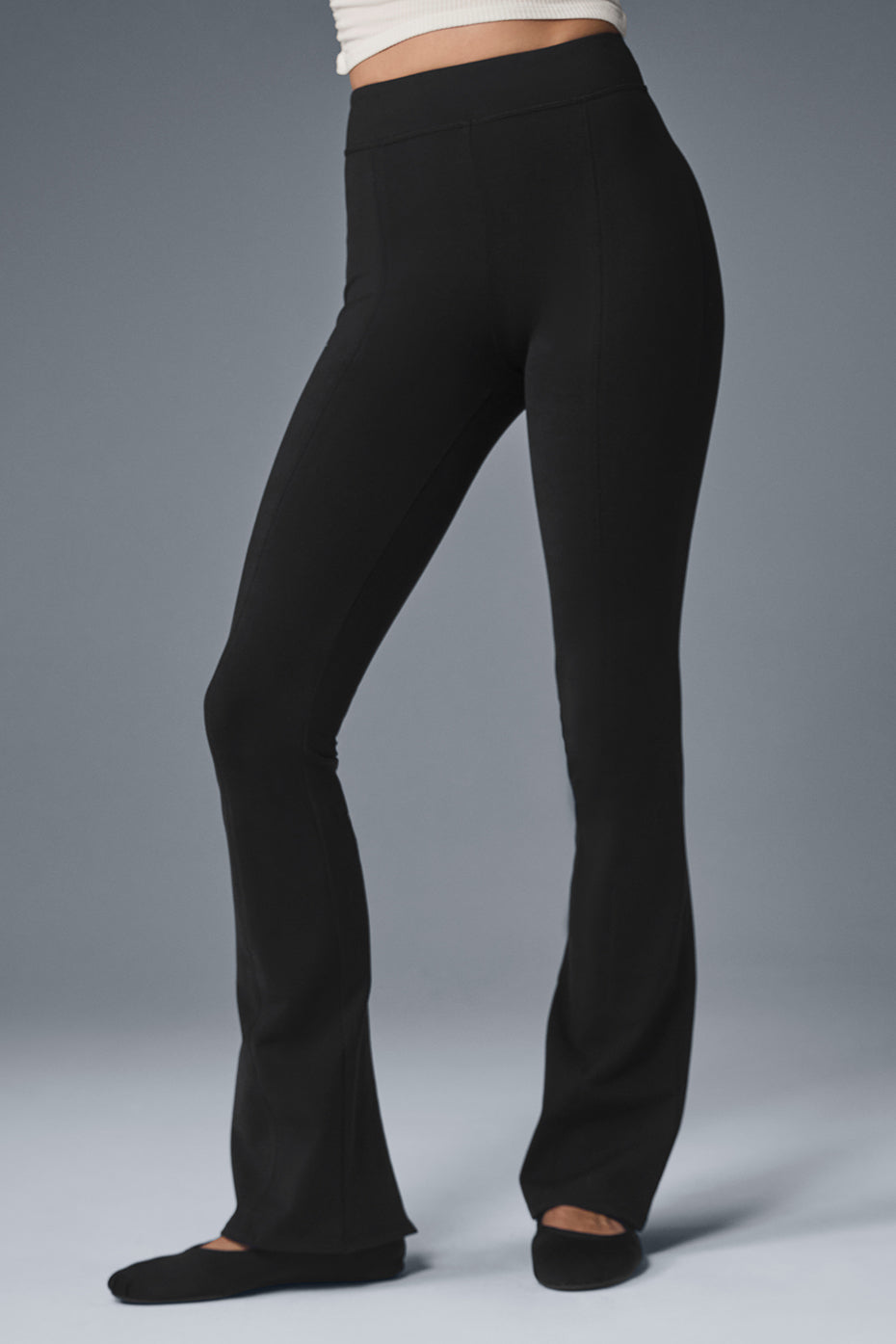 Black flare yoga pants with split back for ventilation and style