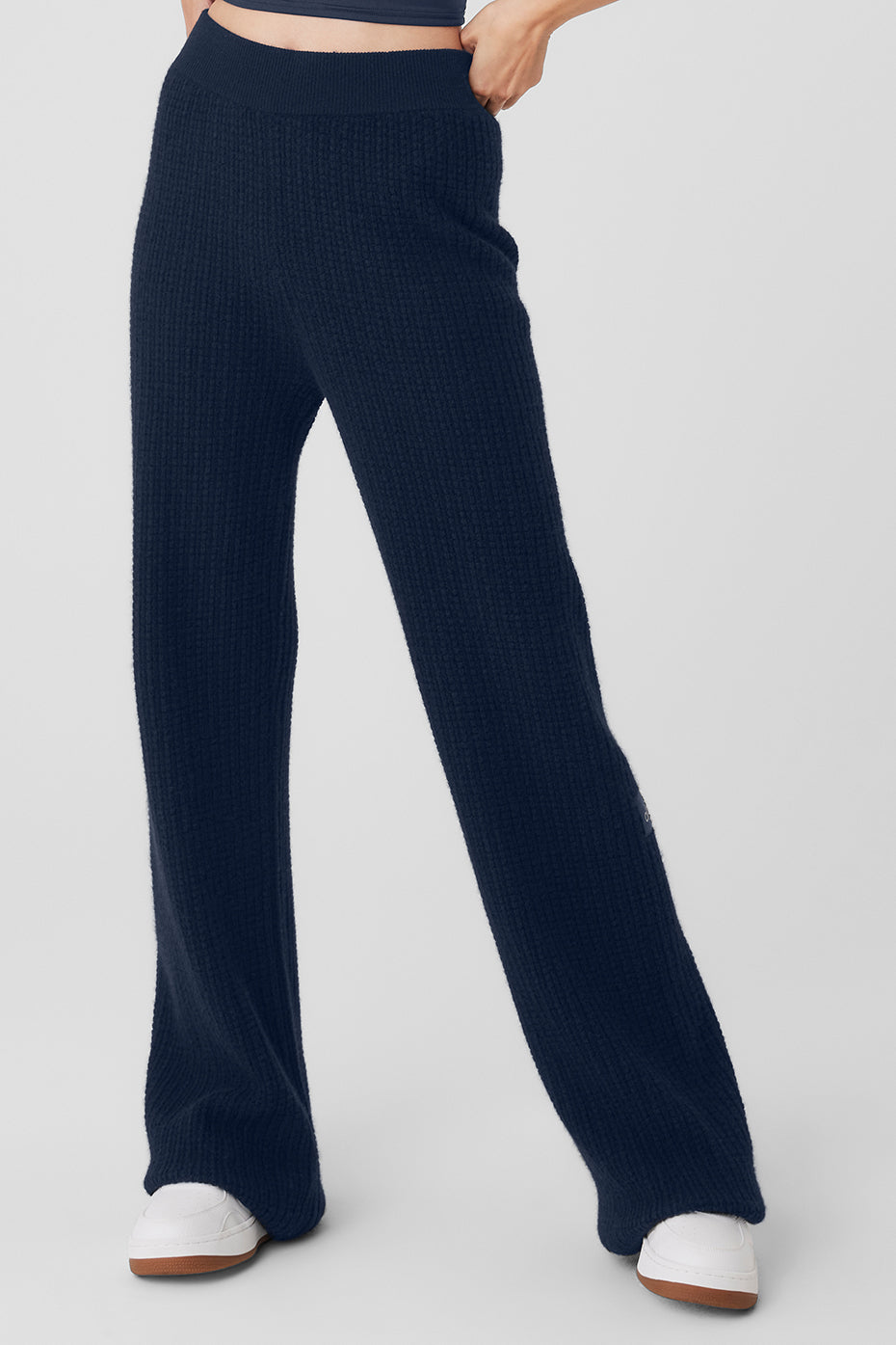 Navy cashmere lounge pants with a high-rise waistband, perfect for cozy days.