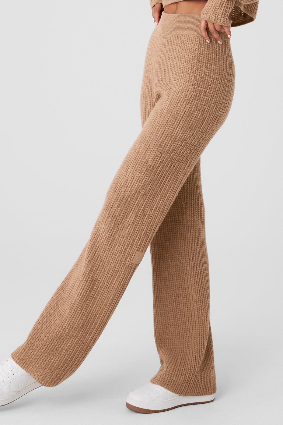 Front view of toasted almond wide leg cashmere lounge pants.