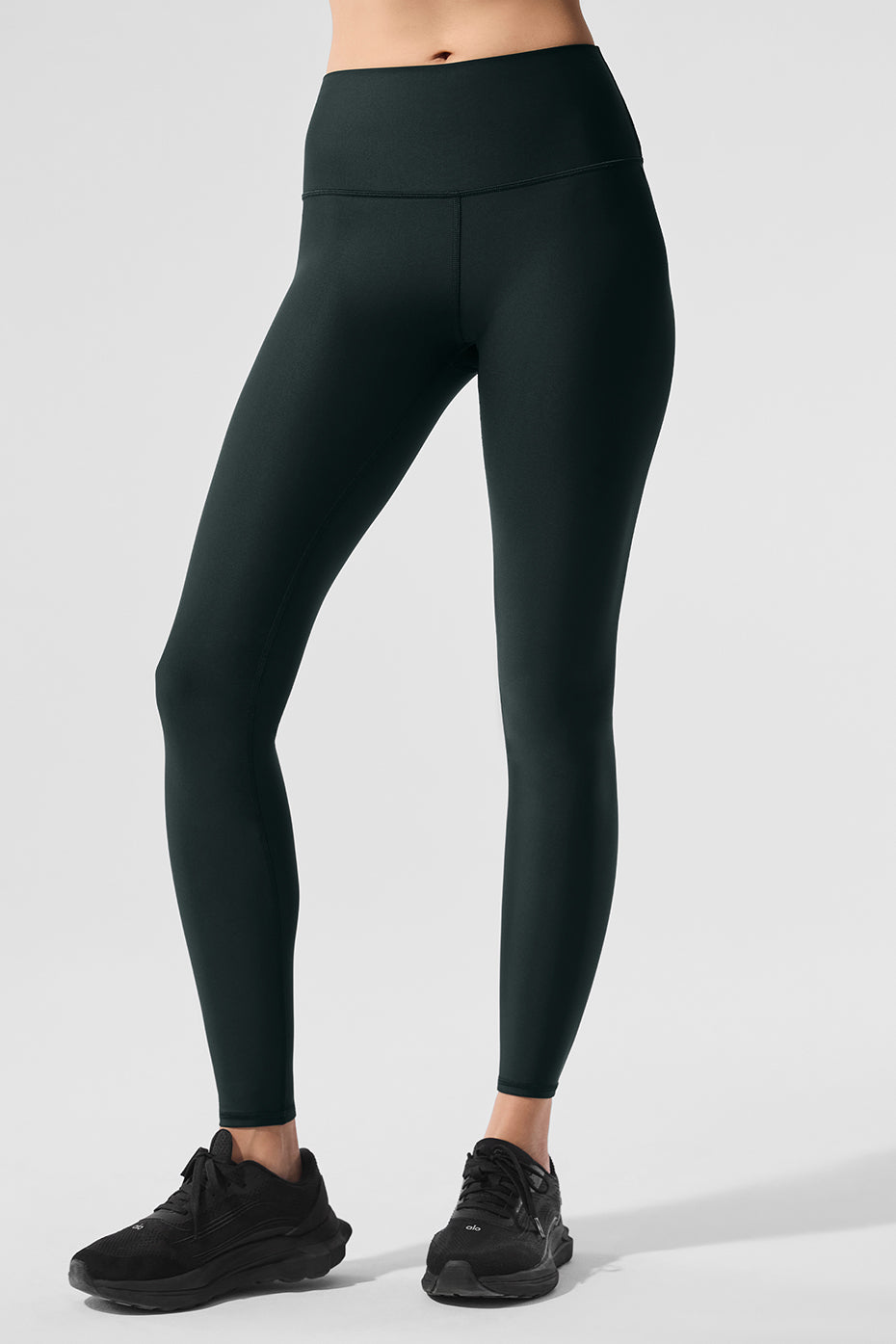 Woman wearing Airlift compression leggings during a workout.