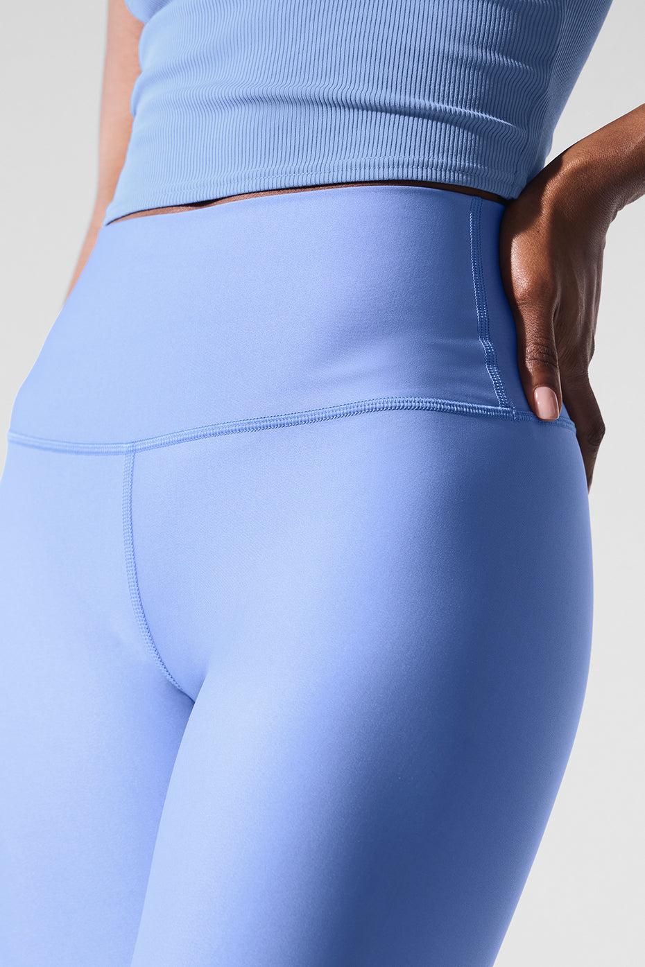 Front view of Airlift high-waisted leggings in Crystal Clear Blue, showcasing the sleek design.