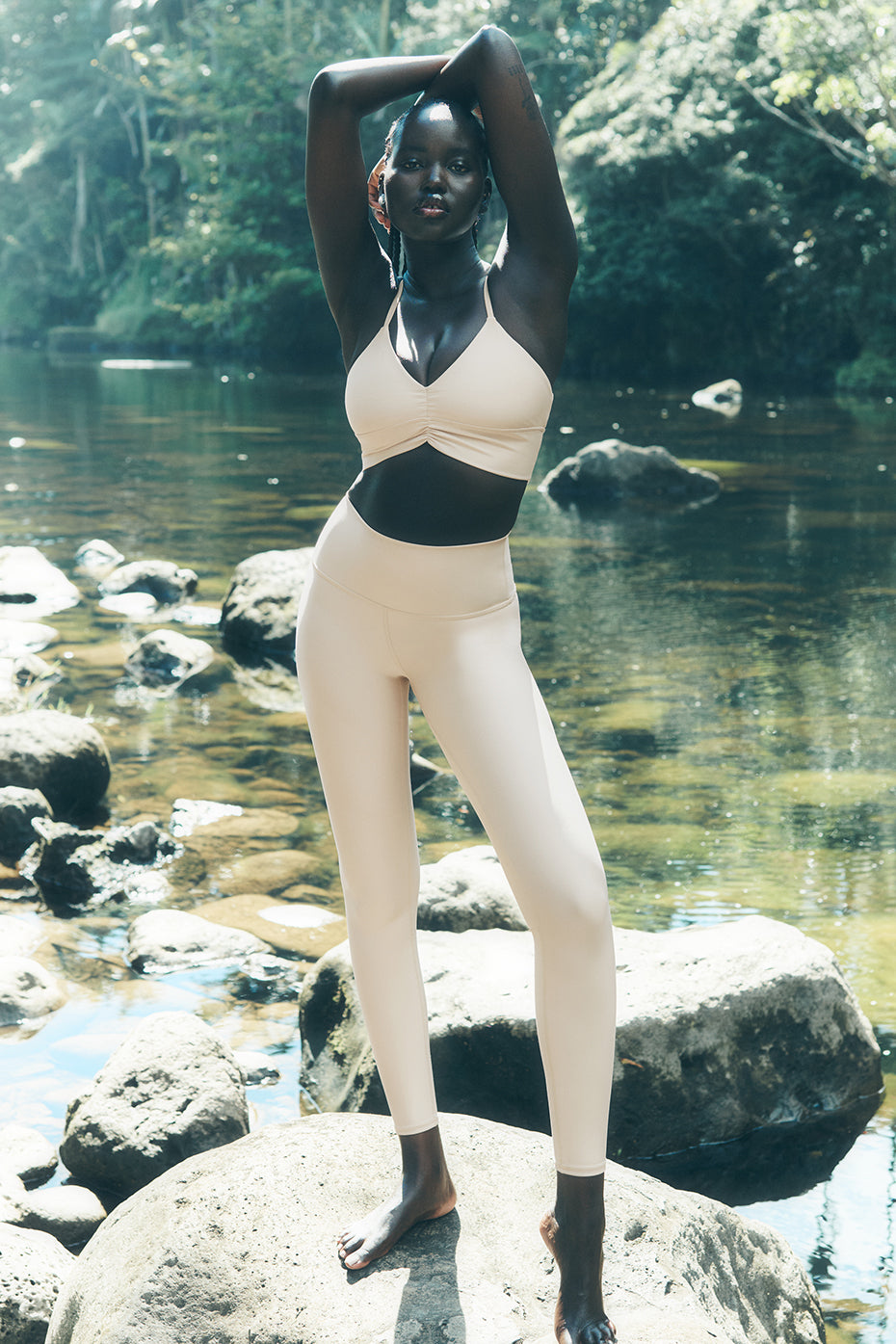 Front view of model wearing Airlift leggings showing high-waist and ankle length fit