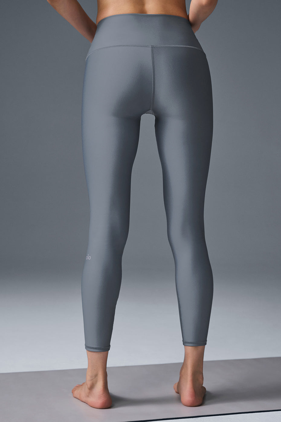 Close-up of compression leggings texture and sculpted fit on legs