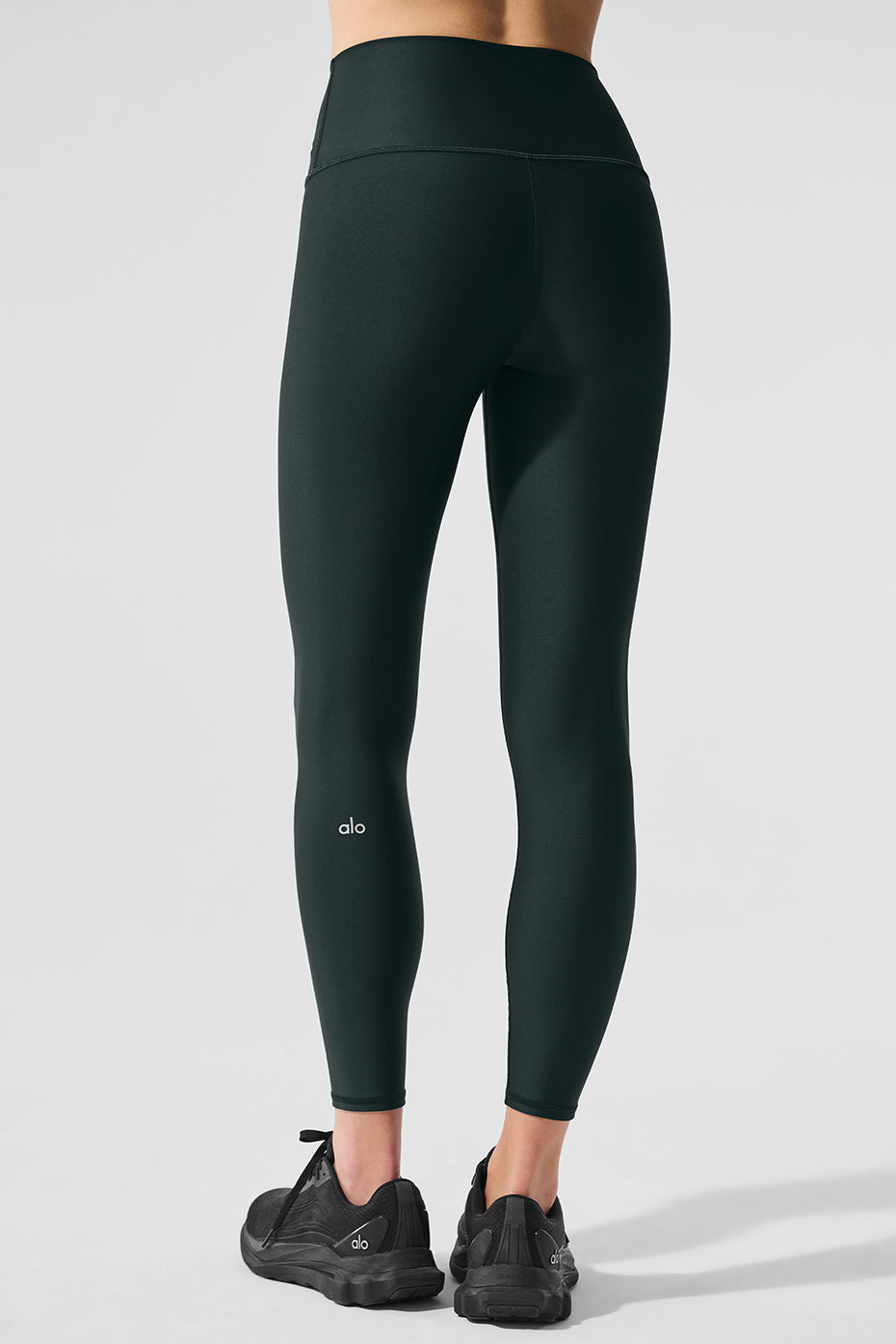 Model wearing 7/8 length leggings showing the double-layered waistband