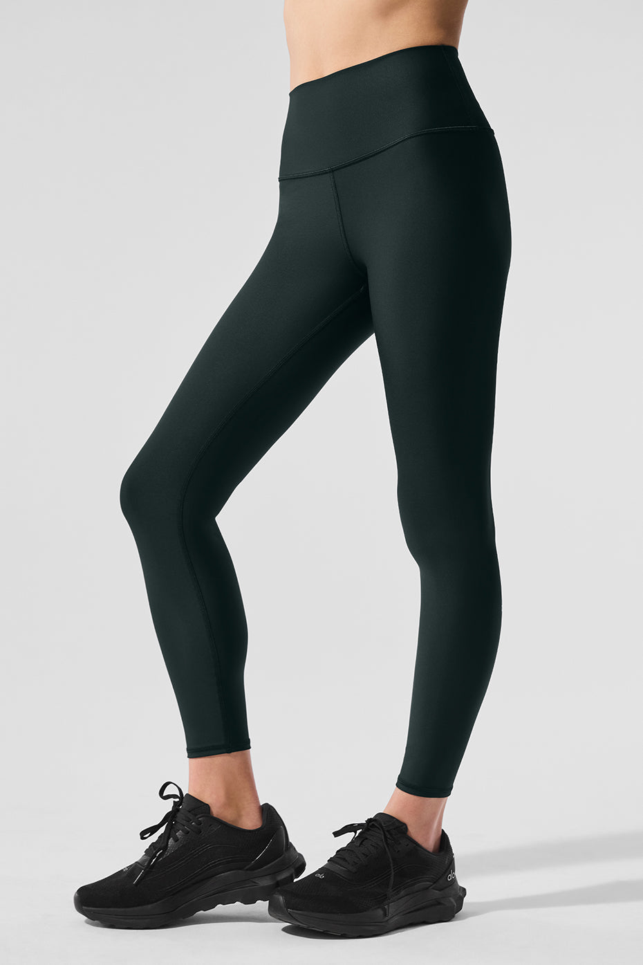 Close-up of the breathable, shiny Airlift fabric on leggings