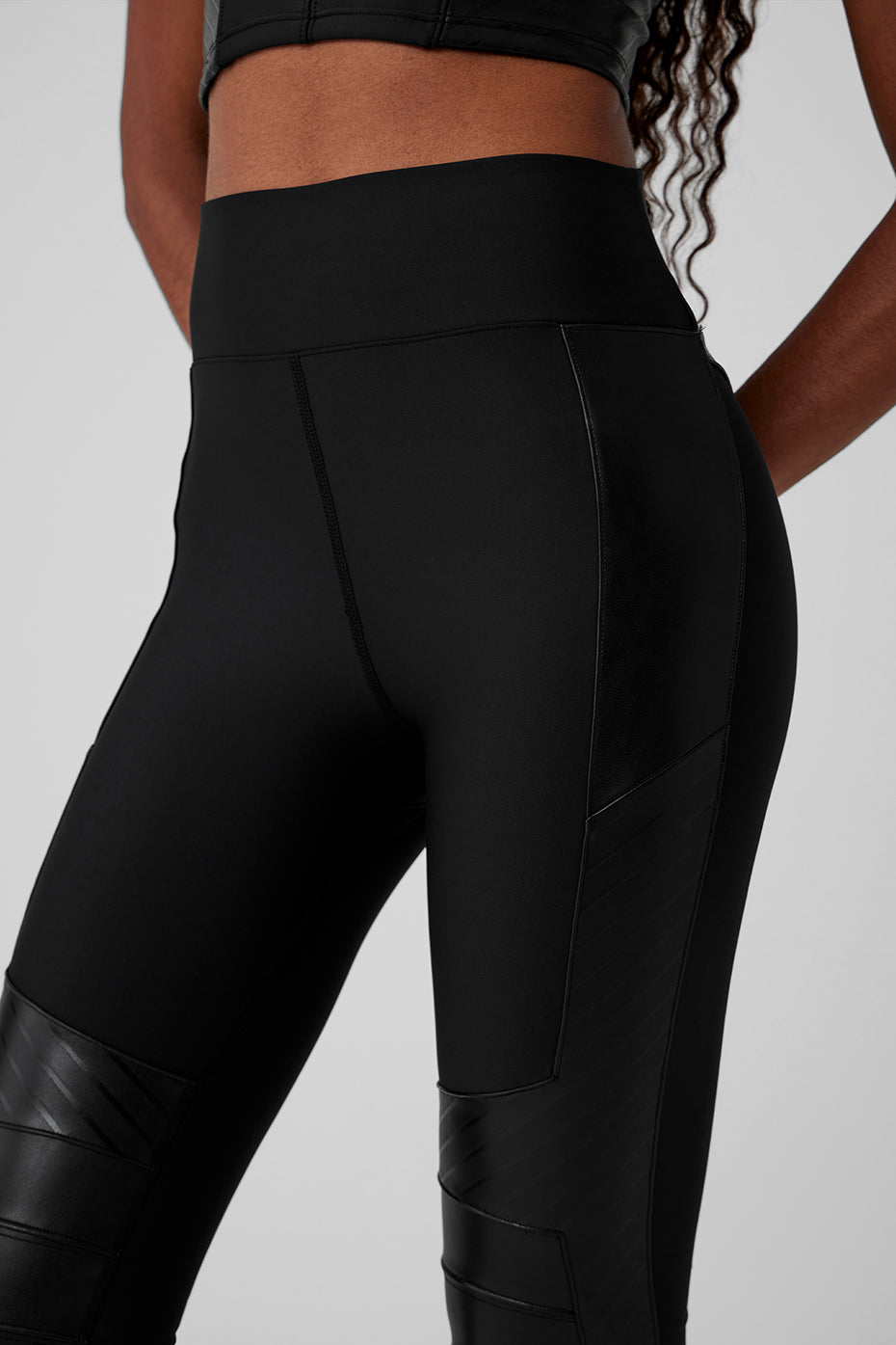 Airlift high-waist leggings in black, featuring faux leather panels.